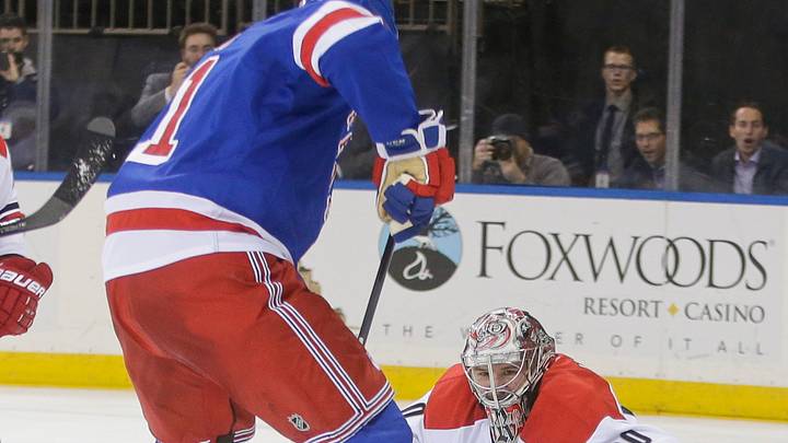 Rangers' Lundqvist has 33 saves in 3-0 win over Hurricanes