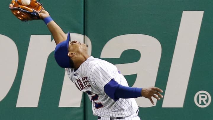 Duda, Flores lead Mets past Braves 3-2 for 10th straight