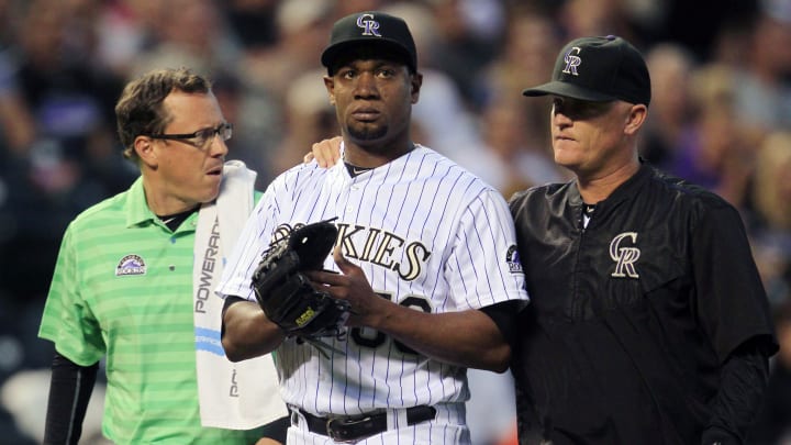 Rockies pitcher Yohan Flande leaves game with leg injury
