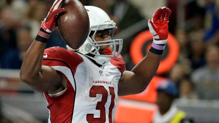 Cardinals roll, Fitzgerald becomes youngest to 1,000 catches