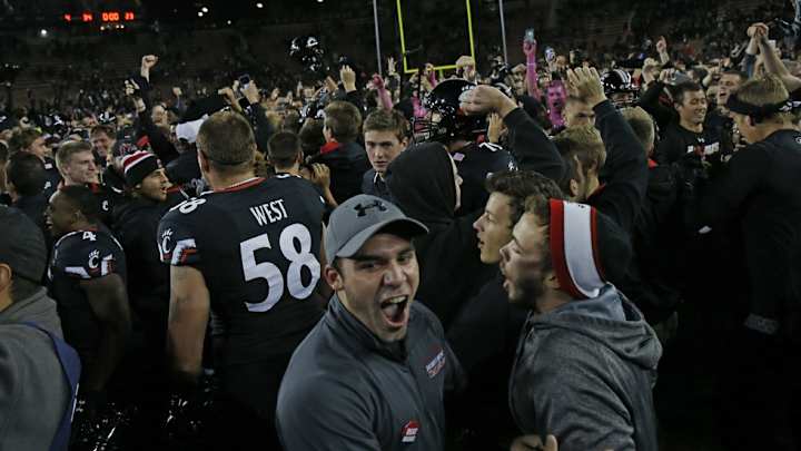 Campus Clicks: Cincinnati fans storm the field, Alabama-Georgia hype video