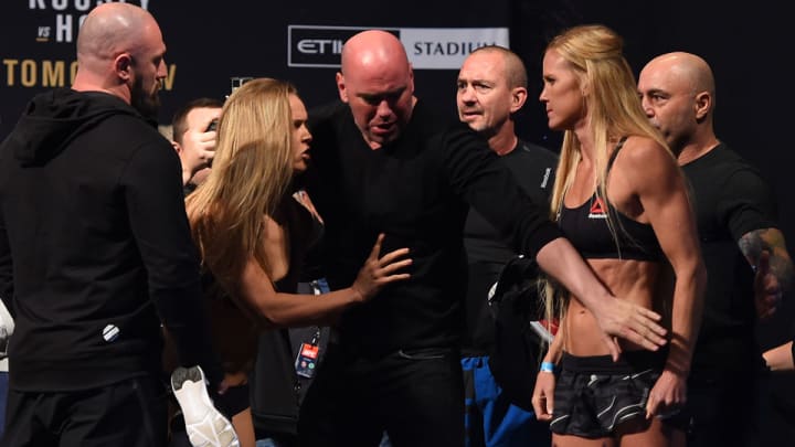 Ronda Rousey, Holly Holm come to shoves at UFC 193 weigh-in Ronda Rousey, Holly Holm come to shoves at UFC 193 weigh-in