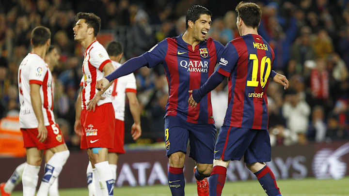 Lionel Messi, Luis Suarez lift first-place Barcelona over Almeria