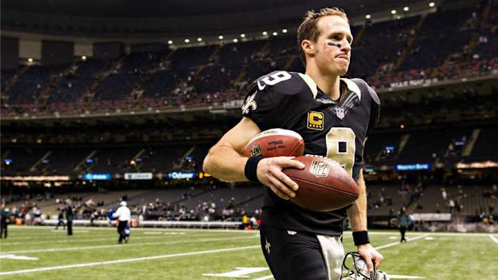 Drew Brees jumps out of a helicopter, wrestles a crocodile with Bear Grylls