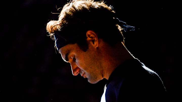 Federer loses to big-serving Isner in Paris Masters third round