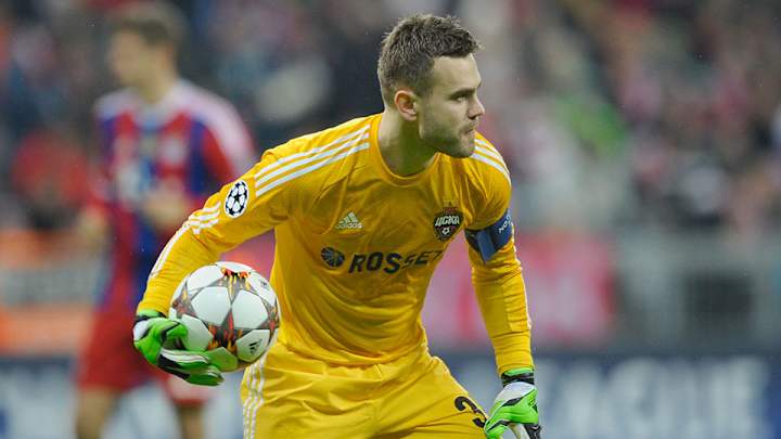 Russia goalkeeper Igor Akinfeev hit by flare during Euro 2016 qualifier