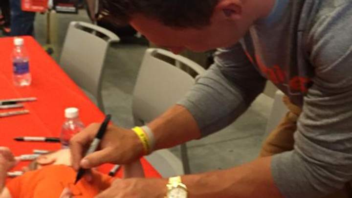Johnny Manziel signed a baby at Browns Fan Fest Johnny Manziel signed a baby at Browns Fan Fest