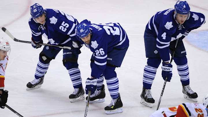 Toronto trades D Franson, F Santorelli to Nashville for draft pick, forwards