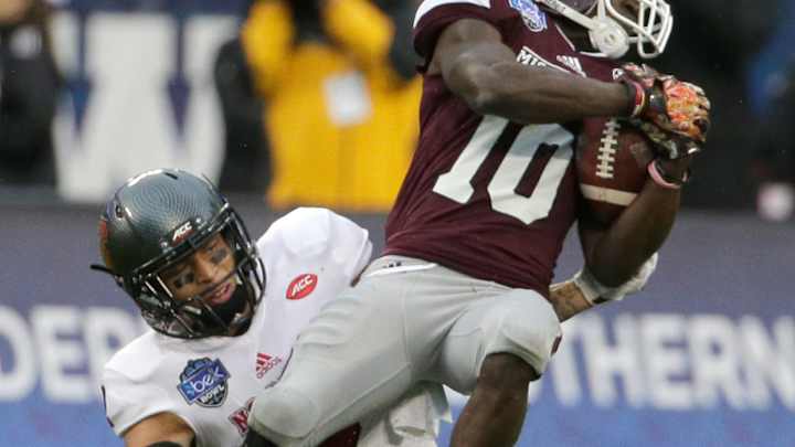 Prescott, Mississippi State top NC State 51-28 in Belk Bowl