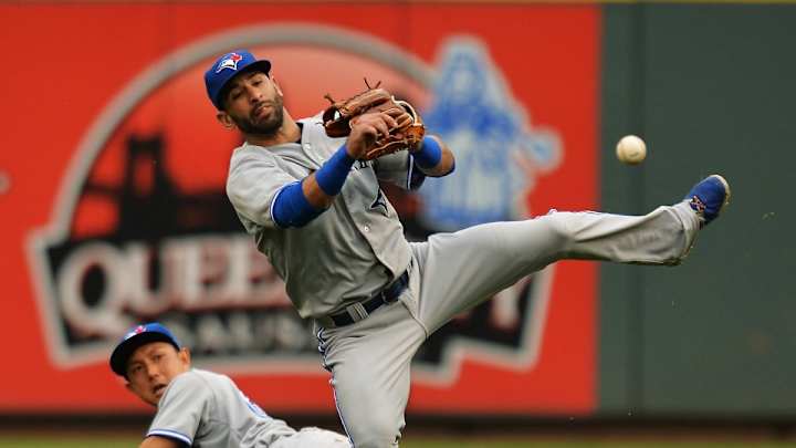 Blue Jays reporter gets hit by errant Jose Bautista throw
