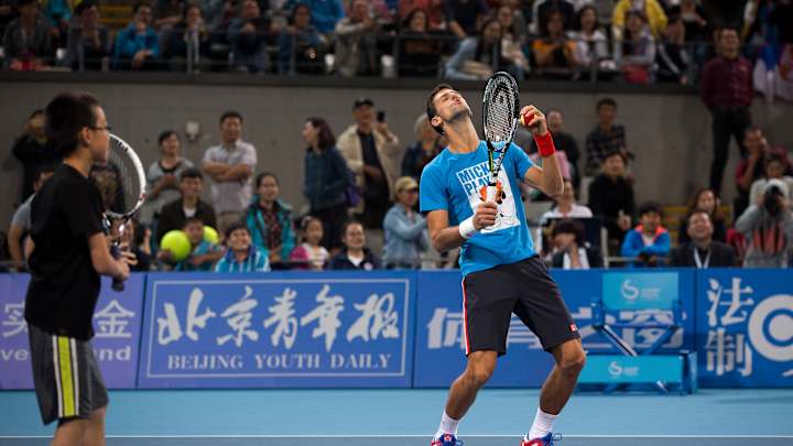 Djokovic improves to 25-0 at China Open with 1st-round win Djokovic improves to 25-0 at China Open with 1st-round win