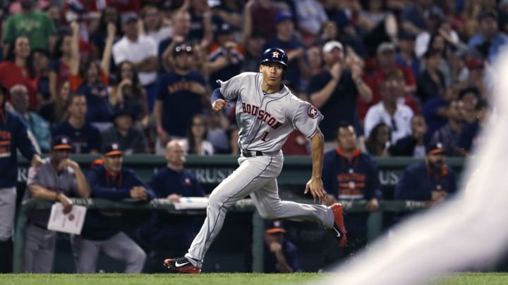 Napoli error leads to 4-run 10th as Astros beat Red Sox 12-8