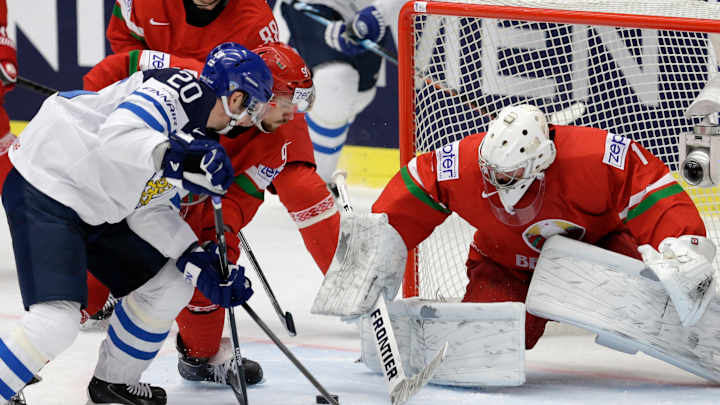 Austria's win sends Swiss into quarters at hockey worlds