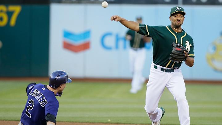 Reddick, Davis, Butler homer for A's in 7-1 win over Rockies