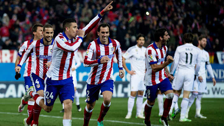 Atletico Madrid takes Copa del Rey edge over rival Real in Torres' return