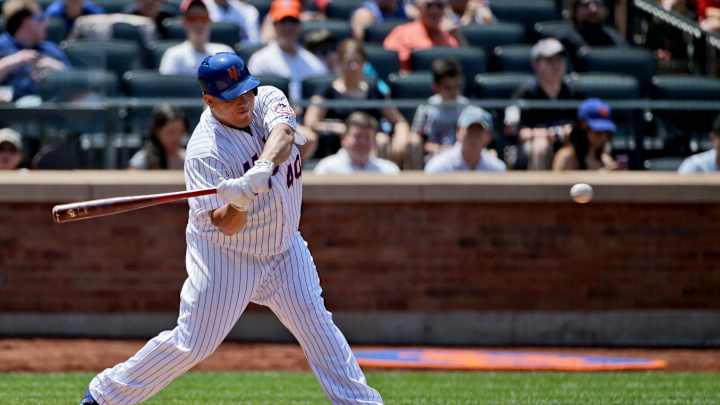 Colon uses arm, bat, becomes NL's top winner, Mets top Miami