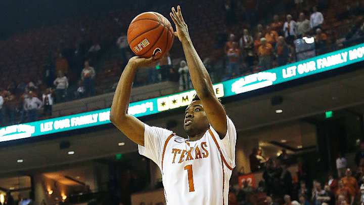 Texas comes back for dramatic win, keeping tourney hopes alive