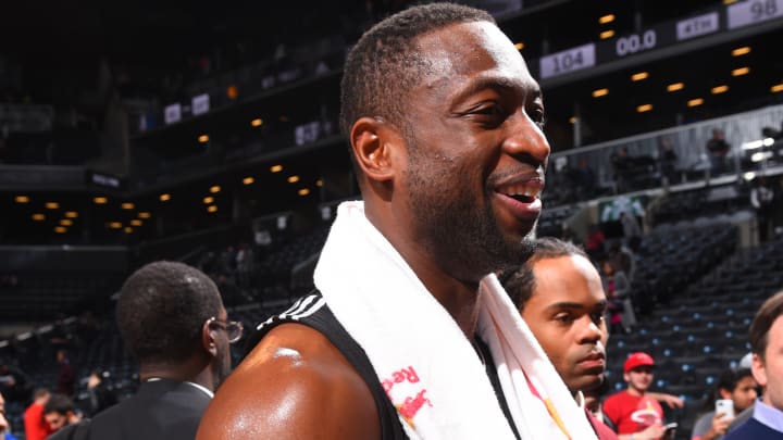 Wade, Heat beat Nets for third straight victory