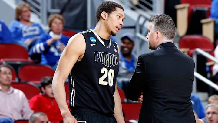 Pass from teammate nails Purdue's A.J. Hammons in face