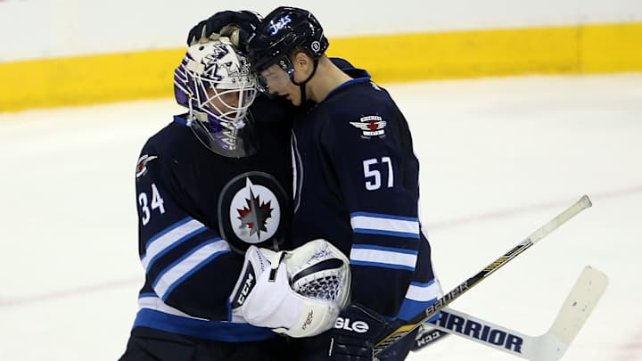 Stafford scores twice, Jets beat Wild 5-4 Stafford scores twice, Jets beat Wild 5-4