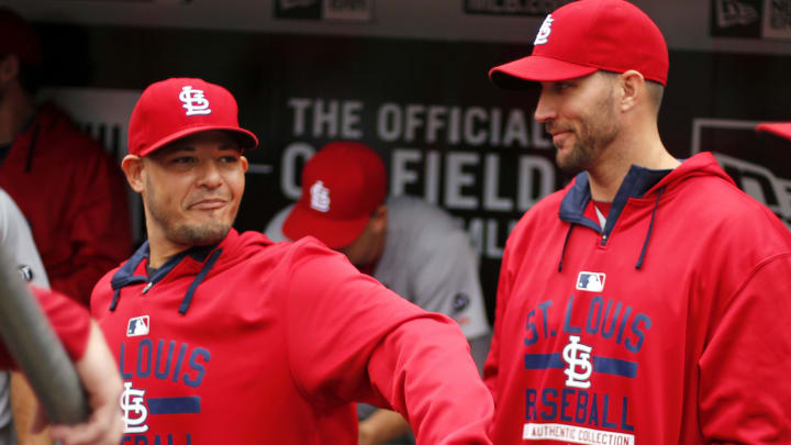 Cards catcher Molina will try to play with splint over thumb