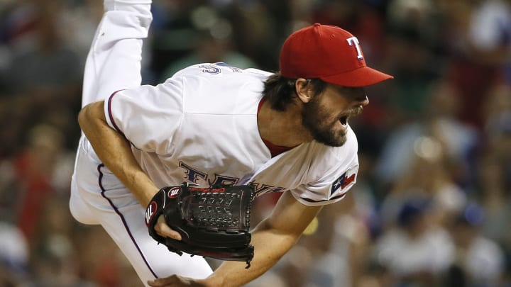 Hamels strikes out 10, Rangers beat Orioles