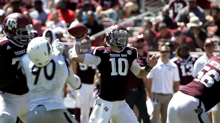 Allen has 4 TD passes to lead Aggies over Nevada 44-27
