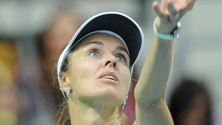 Losing return for Hingis in Fed Cup playoffs