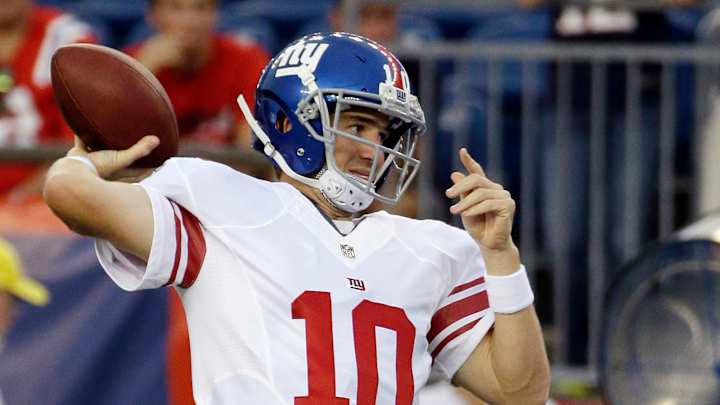 Eli Manning signs four-year contract extension with Giants