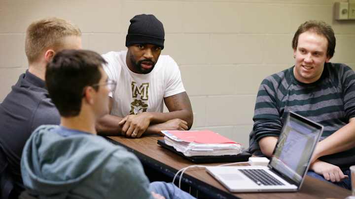 Don Carey taking theological classes after Lions practices