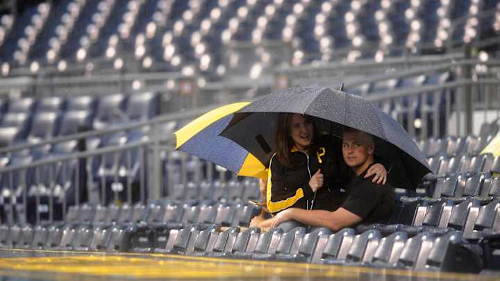 McCutchen helps free grounds crew member swallowed by tarp