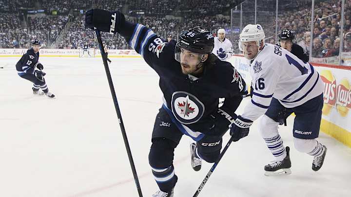 Stafford, Hellebuyck lead Jets to 6-1 win over Maple Leafs