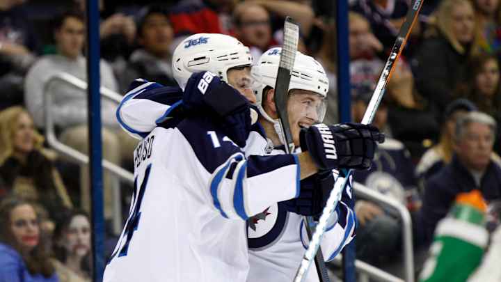 Wheeler helps Jets edge Blue Jackets 3-2
