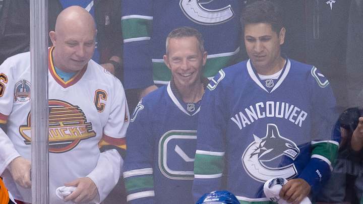 Lack helps Canucks top Flames 4-1, even series