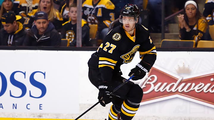 Bruins trade defenseman Hamilton to Flames for 3 draft picks