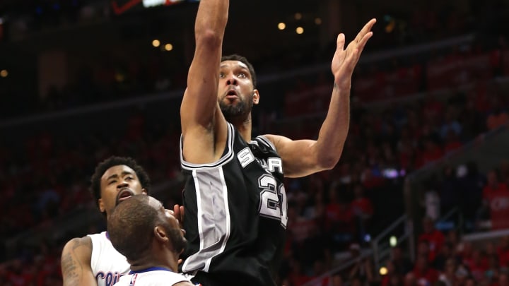 Spurs' Tim Duncan tells paper: 'I'll be back on the court'