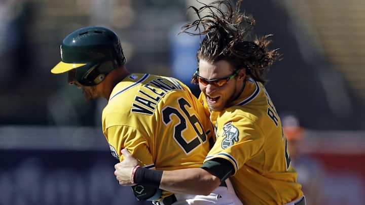Valencia powers A's to 5-4 victory over Astros