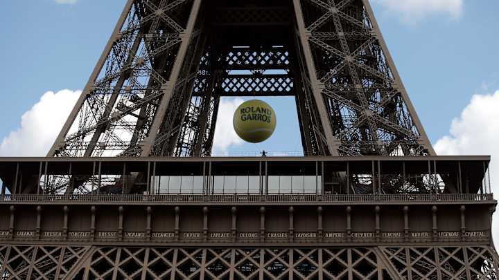 The Latest: Halep to open play on Center Court