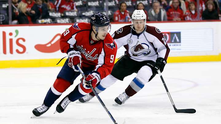 Capitals score 4 in first, beat Avalanche 7-3