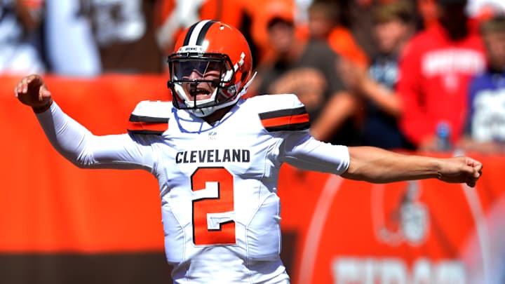 Manziel's 2 TD passes lift Browns over Mariota, Titans 28-14