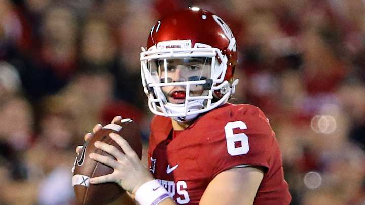 Baker Mayfield leads No. 14 Oklahoma past Iowa State, 52-16