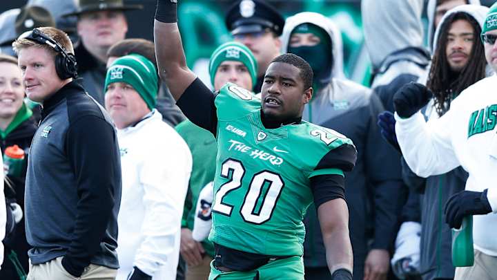 Marshall RB Butler dismissed after allegedly beating same-sex couple