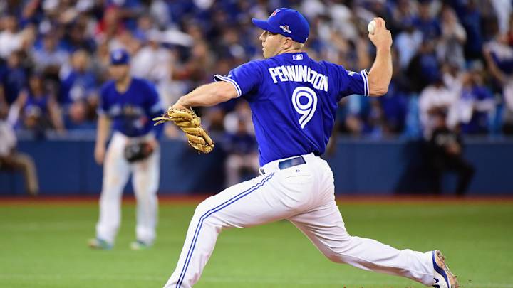 Jays’ Pennington becomes first position player to pitch in playoffs