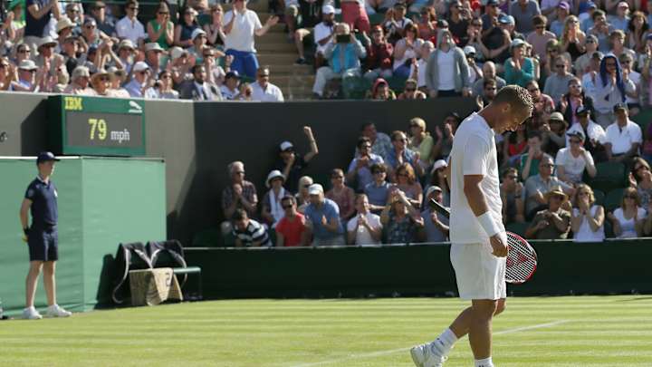 2002 champ Hewitt loses in 1st round at his last Wimbledon