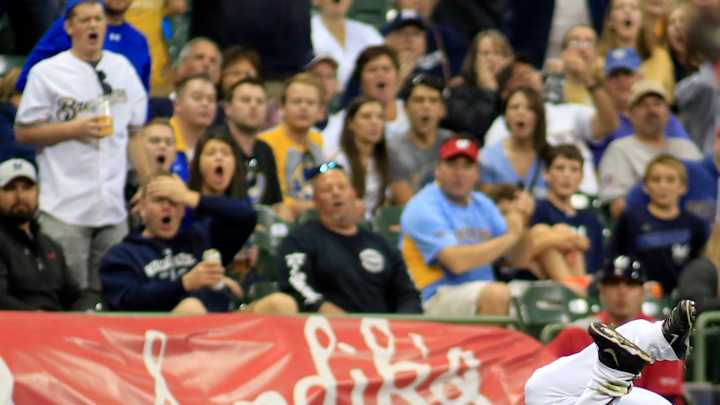 Reds get 9-7 win after Brewers' Herrera injured in collision Reds get 9-7 win after Brewers' Herrera injured in collision