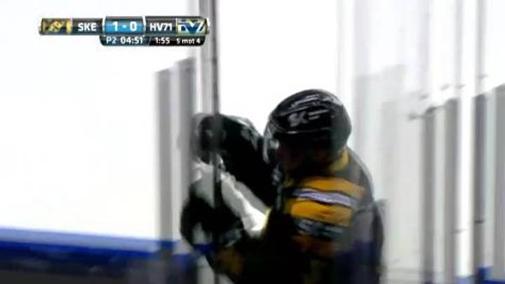 Watch a Swedish hockey player totally wipe out going into the penalty box Watch a Swedish hockey player totally wipe out going into the penalty box