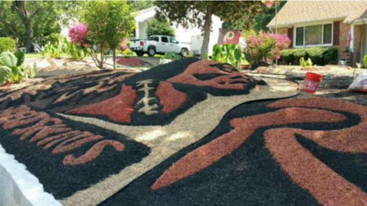 Redskins fan creates team logo out of mulch on front lawn