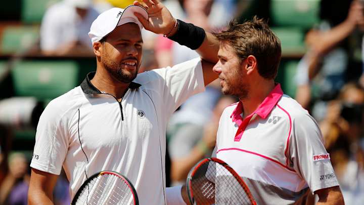 The Latest: Wawrinka and Tsonga underway in French Open semi