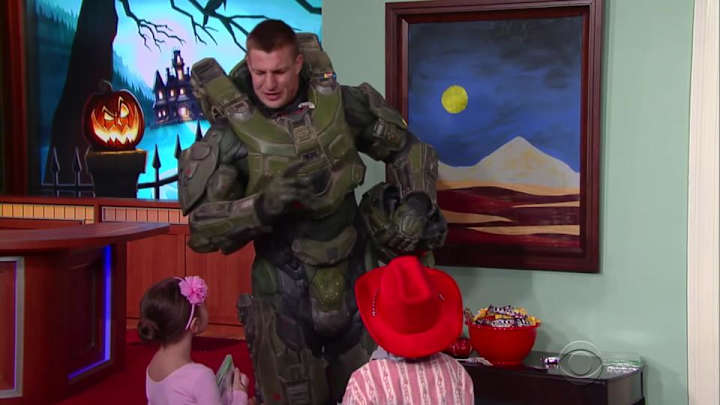 Watch: Gronk trick-or-treats on Colbert, gets ethered by small girl