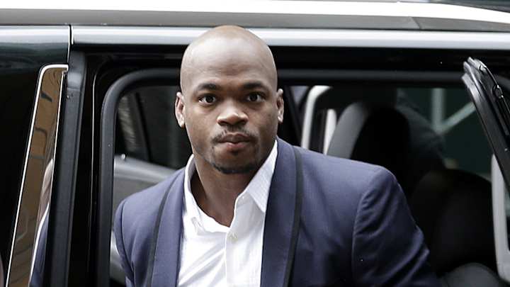 AP Source: Adrian Peterson tells coach he won't be at OTAs